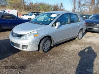 2011 Nissan Versa 1.8 S with VIN 3N1BC1AP5BL432979, listed as a IAAI auction lot 41932890 with 150,041 mi miles. Bid and sale history available at carsss.com. Image 2.