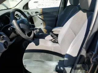 2004 Ford Focus SE with VIN 1FAFP34304W165468, listed as a Copart auction lot 45719985 with 208,259 mi miles and Salvage title. Bid and sale history available at DreamBid. Image 7.