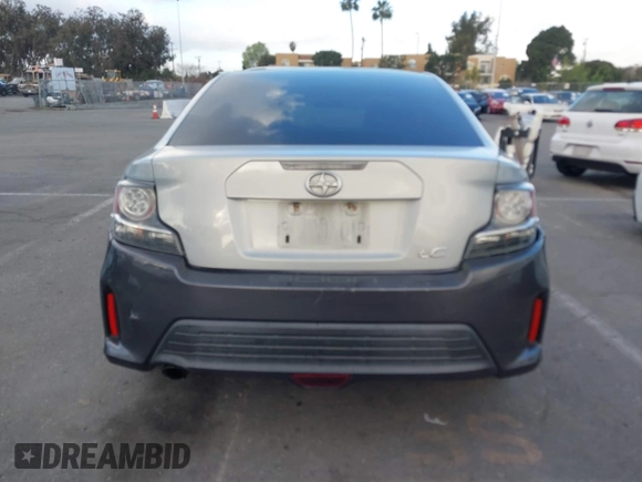 2014 Scion tC z VIN JTKJF5C79E3073875, wystawiony jako IAAI lot #41536021 z przebiegiem 158 154 mil mil oraz . Historia ofert i sprzedaży dostępna na DreamBid. Obrazek 16.