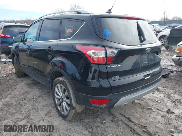 2018 Ford Escape Titanium with VIN 1FMCU0J90JUD17085, listed as a IAAI auction lot 41699687 with Not provided miles and . Bid and sale history available at DreamBid. Image 3.