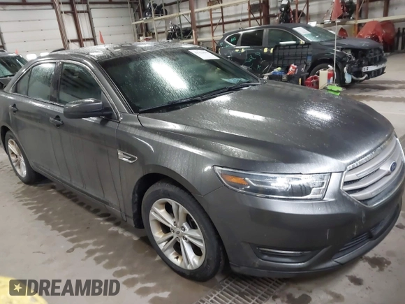 2015 Ford Taurus SEL with VIN 1FAHP2E87FG207029, listed as a IAAI auction lot 41752890 with 119,858 mi miles and . Bid and sale history available at carsss.com. Image 1.
