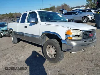 2000 GMC New Sierra 1500 SLE with VIN 2GTEK19TXY1200323, listed as a IAAI auction lot 41294374 with 264,037 mi miles. Bid and sale history available at carsss.com. Image 1.