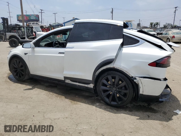 2017 Tesla Model X 90D with VIN 5YJXCAE26HF079421, listed as a Copart auction lot 47889005 with 88,281 mi miles and Salvage Title. Bid and sale history available at DreamBid. Image 2.
