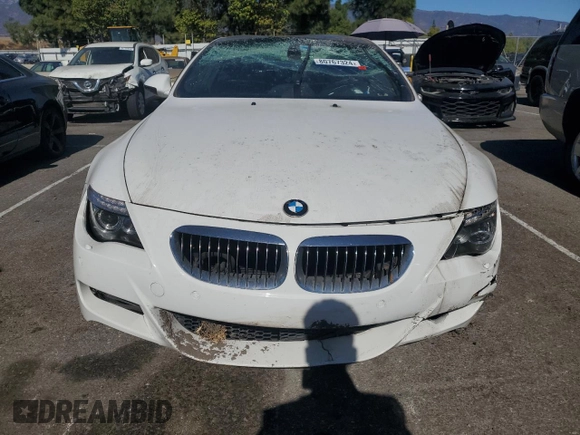 2010 BMW M6 z VIN WBSEH9C52ACY25220, wystawiony jako Copart lot #80767324 z przebiegiem Nie podano mil oraz Szkoda całkowita • Salvage title. Historia ofert i sprzedaży dostępna na DreamBid. Obrazek 5.