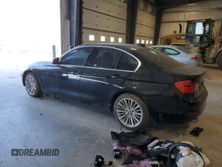 2015 BMW 3 Series 328i xDrive with VIN WBA3B3C57FJ984800, listed as a Copart auction lot 89402685 with 0 mi miles and Salvage Title. Bid and sale history available at carsss.com. Image 2.