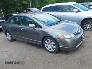 2006 Honda Civic LX with VIN 1HGFA16576L038785, listed as a IAAI auction lot 42735823 with 130,401 mi miles and . Bid and sale history available at DreamBid. Image 1.