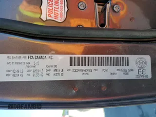 2015 Dodge Charger SXT with VIN 2C3CDXHG9FH856319, listed as a Copart auction lot 57251335 with 171,454 mi miles and Salvage title. Bid and sale history available at DreamBid. Image 12.
