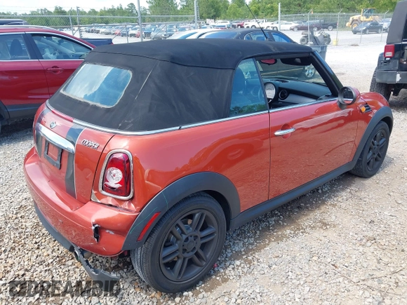 2011 MINI Convertible with VIN WMWZN3C57BTZ89303, listed as a IAAI auction lot 42352242 with 146,448 mi miles and . Bid and sale history available at DreamBid. Image 4.