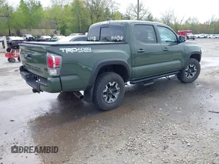 2021 Toyota Tacoma SR with VIN 3TMCZ5AN5MM380286, listed as a IAAI auction lot 42165523 with 58,965 mi miles and . Bid and sale history available at DreamBid. Image 4.