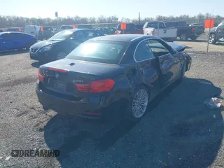 2014 BMW 4 Series 428i with VIN WBA3V7C59EJ872576, listed as a IAAI auction lot 41997699 with Not provided miles and . Bid and sale history available at DreamBid. Image 4.