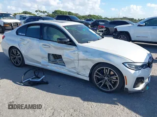 2021 BMW 3 Series M340i with VIN 3MW5U7J03M8B55863, listed as a IAAI auction lot 41585737 with 42,076 mi miles. Bid and sale history available at carsss.com. Image 1.