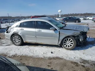 2012 Chrysler 200 Touring with VIN 1C3CCBBG9CN321735, listed as a IAAI auction lot 41597517 with 163,747 mi miles. Bid and sale history available at carsss.com. Image 13.