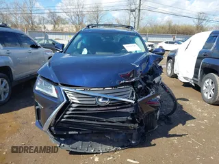 2016 Lexus RX 350 with VIN 2T2BZMCA2GC004895, listed as a IAAI auction lot 41859749 with 104,370 mi miles and . Bid and sale history available at DreamBid. Image 12.