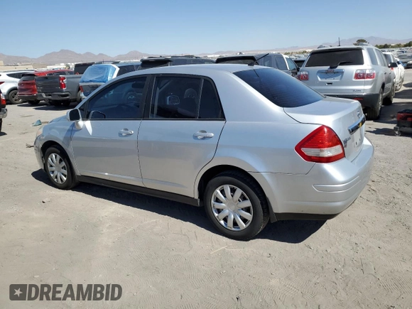 2011 Nissan Versa S with VIN 3N1BC1AP0BL410081, listed as a Copart auction lot 73737064 with 201,142 mi miles and Salvage title. Bid and sale history available at DreamBid. Image 2.