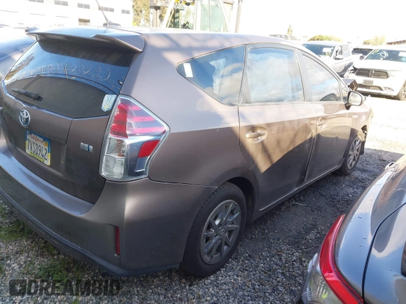2015 Toyota Prius Two with VIN JTDZN3EU4FJ040526, listed as a IAAI auction lot 41582274 with 137,797 mi miles and . Bid and sale history available at DreamBid. Image 4.