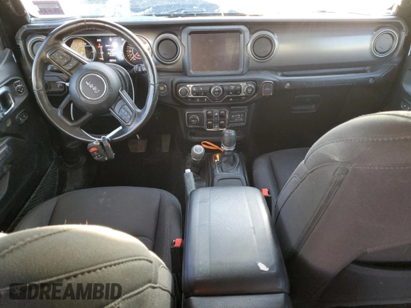 2023 Jeep Wrangler Willys with VIN 1C4HJXDG1PW527567, listed as a Copart auction lot 42218255 with 43,273 mi miles and Salvage Title. Bid and sale history available at DreamBid. Image 8.