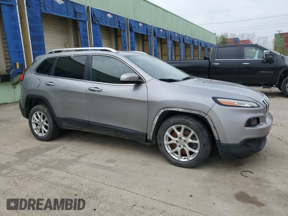 2015 Jeep Cherokee Latitude with VIN 1C4PJLCS7FW539800, listed as a Copart auction lot 53125525 with 127,825 mi miles and Clean Title. Bid and sale history available at carsss.com. Image 4.