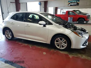 2022 Toyota Corolla Hatchback SE with VIN JTND4MBE4N3182793, listed as a Copart auction lot 69609184 with 21,813 mi miles and Salvage Title. Bid and sale history available at carsss.com. Image 4.