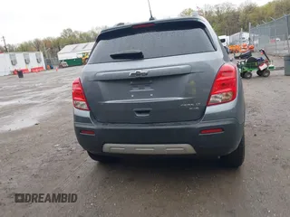 2015 Chevrolet Trax LT with VIN KL7CJRSBXFB097960, listed as a IAAI auction lot 41976883 with 98,621 mi miles and . Bid and sale history available at carsss.com. Image 16.