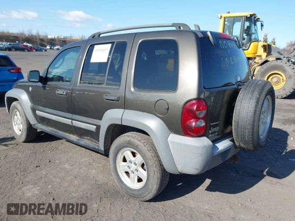 2005 Jeep Liberty Sport with VIN 1J4GL48K85W700799, listed as a IAAI auction lot 42054433 with 166,989 mi miles. Bid and sale history available at carsss.com. Image 3.