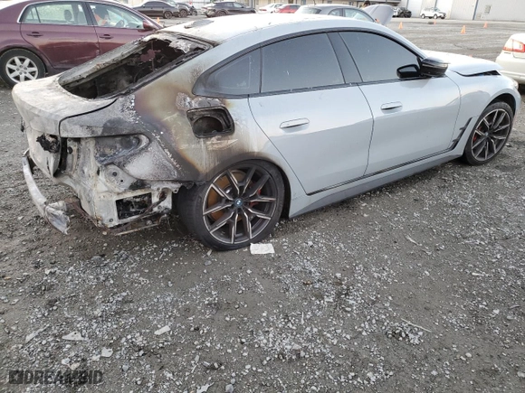 2023 BMW i4 M50 with VIN WBY33AW03PFN52597, listed as a Copart auction lot 44956705 with NaN miles and Salvage Title. Bid and sale history available at carsss.com. Image 3.