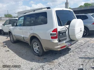 2002 Mitsubishi Montero LTD with VIN JA4MW51RX2J004459, listed as a IAAI auction lot 41963113 with 212,764 mi miles. Bid and sale history available at carsss.com. Image 3.