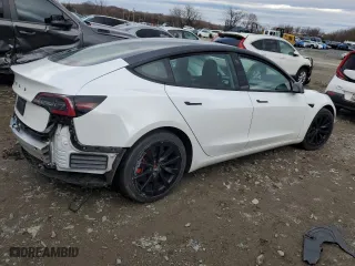 2021 Tesla Model 3 Standard Range Plus with VIN 5YJ3E1EA5MF028051, listed as a Copart auction lot 48085105 with 49,531 mi miles and Clean Title. Bid and sale history available at carsss.com. Image 3.