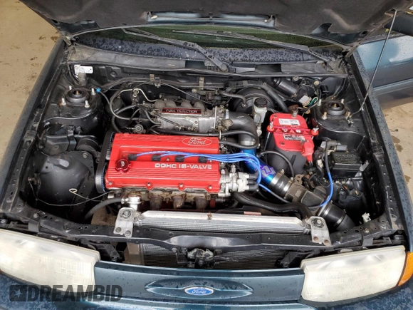 1996 Ford Escort z VIN 1FASP11J0TW123967, wystawiony jako Copart lot #52859835 z przebiegiem 164 693 mil mil oraz Szkoda całkowita • Salvage title. Historia ofert i sprzedaży dostępna na DreamBid. Obrazek 11.
