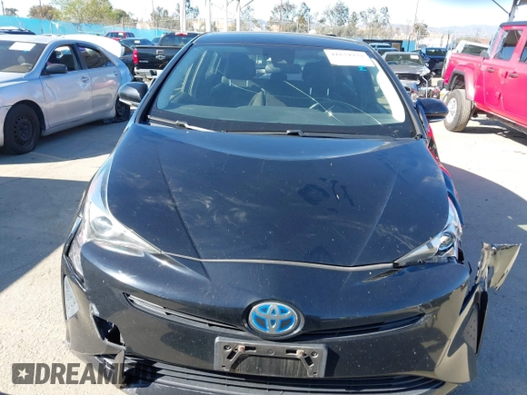 2017 Toyota Prius Two with VIN JTDKARFU1H3039405, listed as a IAAI auction lot 41834929 with 133,948 mi miles and . Bid and sale history available at DreamBid. Image 12.