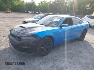 2015 Dodge Charger SXT with VIN 2C3CDXHG1FH848019, listed as a IAAI auction lot 42124399 with 175,247 mi miles and . Bid and sale history available at DreamBid. Image 17.