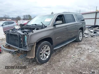 2015 GMC Yukon XL SLT with VIN 1GKS2HKC6FR582574, listed as a IAAI auction lot 41187550 with 185,737 mi miles. Bid and sale history available at carsss.com. Image 20.