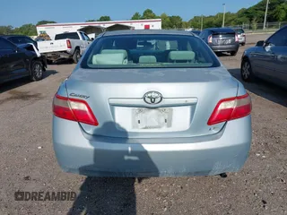 2007 Toyota Camry CE z VIN 4T1BE46K97U714024, wystawiony jako IAAI lot #42416410 z przebiegiem 218 500 mil mil oraz . Historia ofert i sprzedaży dostępna na DreamBid. Obrazek 16.