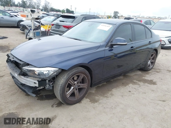 2014 BMW 3 Series 328i with VIN WBA3C1C56EK108665, listed as a IAAI auction lot 42101319 with 84,928 mi miles and . Bid and sale history available at DreamBid. Image 2.