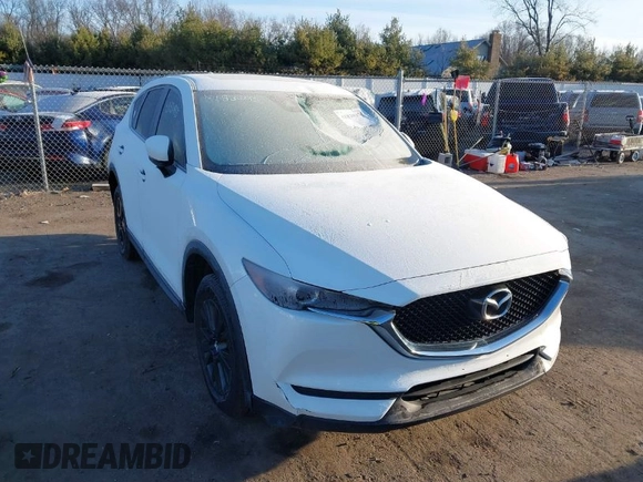 2017 Mazda CX-5 Touring with VIN JM3KFBCL8H0136601, listed as a IAAI auction lot 41830355 with 113,677 mi miles. Bid and sale history available at carsss.com. Image 1.