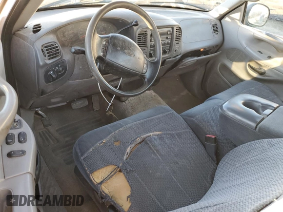 1997 Ford F-150 XL with VIN 1FTDF08W3VKD54292, listed as a Copart auction lot 80205784 with 186,944 mi miles and Salvage Title. Bid and sale history available at carsss.com. Image 8.