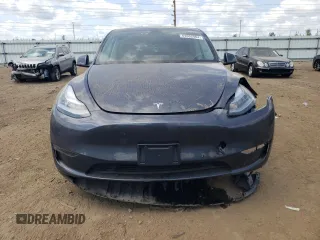 2022 Tesla Model Y Long Range with VIN 7SAYGDEE3NA007737, listed as a Copart auction lot 64602984 with 42,597 mi miles and Salvage Title. Bid and sale history available at carsss.com. Image 5.