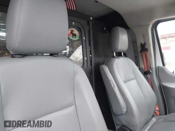 2016 Ford Transit Cargo with VIN 1FTYE1YM0GKB19151, listed as a IAAI auction lot 42029234 with 240,441 mi miles and . Bid and sale history available at DreamBid. Image 8.