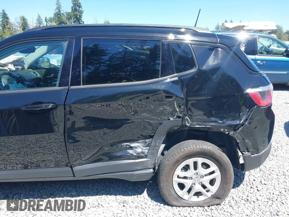 2018 Jeep Compass Sport with VIN 3C4NJDAB1JT261863, listed as a IAAI auction lot 42677037 with 93,263 mi miles and . Bid and sale history available at DreamBid. Image 6.