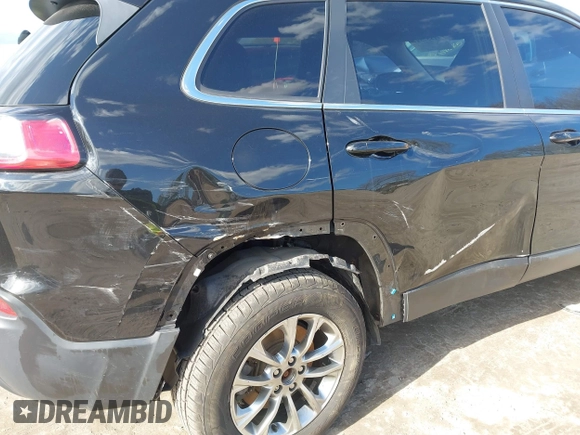 2020 Jeep Cherokee Latitude Plus with VIN 1C4PJMLB0LD591217, listed as a IAAI auction lot 41857544 with 102,704 mi miles and . Bid and sale history available at DreamBid. Image 6.