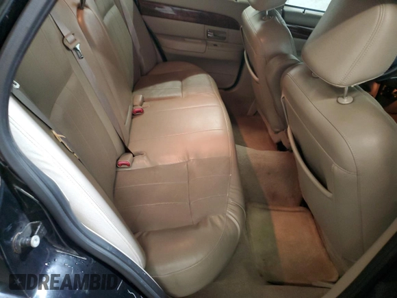 2010 Mercury Grand Marquis LS z VIN 2MEBM7FV6AX628705, wystawiony jako Copart lot #52185105 z przebiegiem 139 485 mil mil oraz Szkody całkowita. Historia ofert i sprzedaży dostępna na DreamBid. Obrazek 10.