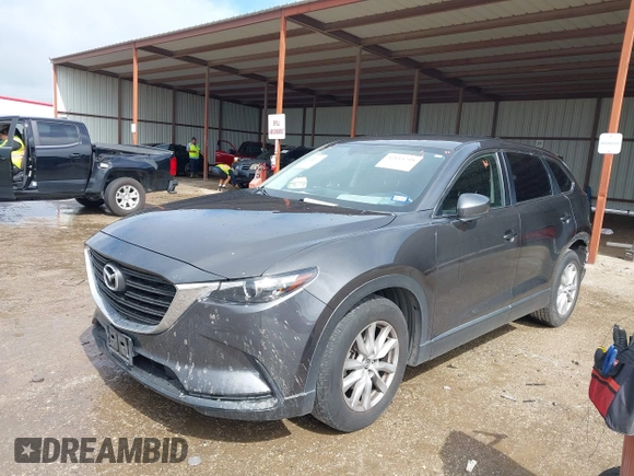 2016 Mazda CX-9 Sport with VIN JM3TCABY5G0122478, listed as a IAAI auction lot 42115795 with 134,980 mi miles and . Bid and sale history available at DreamBid. Image 17.