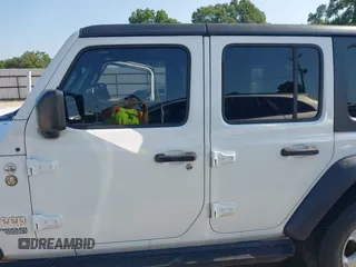 2020 Jeep Wrangler Unlimited Sport S with VIN 1C4HJXDG9LW237507, listed as a IAAI auction lot 42377928 with 48,217 mi miles and . Bid and sale history available at DreamBid. Image 14.