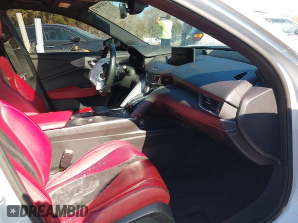 2022 Acura TLX w/A-Spec Package with VIN 19UUB6F52NA002062, listed as a IAAI auction lot 41853469 with 77,301 mi miles and . Bid and sale history available at DreamBid. Image 5.