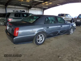 2005 Cadillac DeVille with VIN 1G6KD54Y95U246350, listed as a Copart auction lot 51002715 with 0 mi miles and Salvage Title. Bid and sale history available at carsss.com. Image 3.