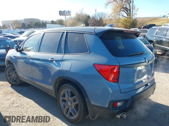 2022 Honda Passport EX-L with VIN 5FNYF7H57NB005716, listed as a IAAI auction lot 41078499 with 33,141 mi miles and . Bid and sale history available at DreamBid. Image 14.