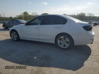 2016 BMW 3 Series 328i with VIN WBA8E9G54GNT44077, listed as a Copart auction lot 52255465 with 127,496 mi miles and Salvage Title. Bid and sale history available at carsss.com. Image 2.