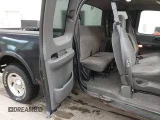 2000 Ford F-150 XL with VIN 1FTRX18W9YNB67215, listed as a IAAI auction lot 42558112 with 118,628 mi miles and . Bid and sale history available at DreamBid. Image 8.