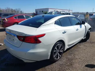 2016 Nissan Maxima SL z VIN 1N4AA6AP8GC413489, wystawiony jako IAAI lot #41899453 z przebiegiem 133 823 mil mil oraz . Historia ofert i sprzedaży dostępna na DreamBid. Obrazek 4.