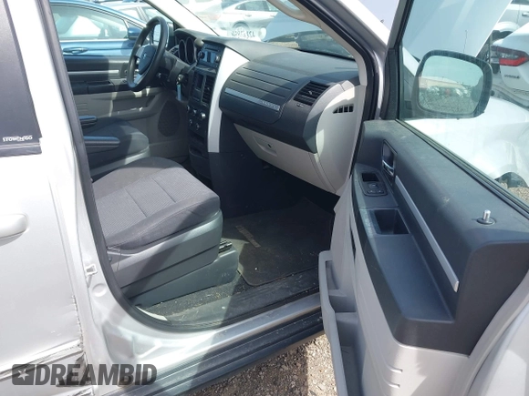 2010 Dodge Grand Caravan SE with VIN 2D4RN4DE2AR216156, listed as a IAAI auction lot 42143850 with 244,624 mi miles and . Bid and sale history available at DreamBid. Image 5.