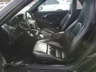 2004 Porsche 911 Carrera with VIN WP0CA29974S653815, listed as a Copart auction lot 80561034 with 63,686 mi miles and Salvage Title. Bid and sale history available at carsss.com. Image 7.